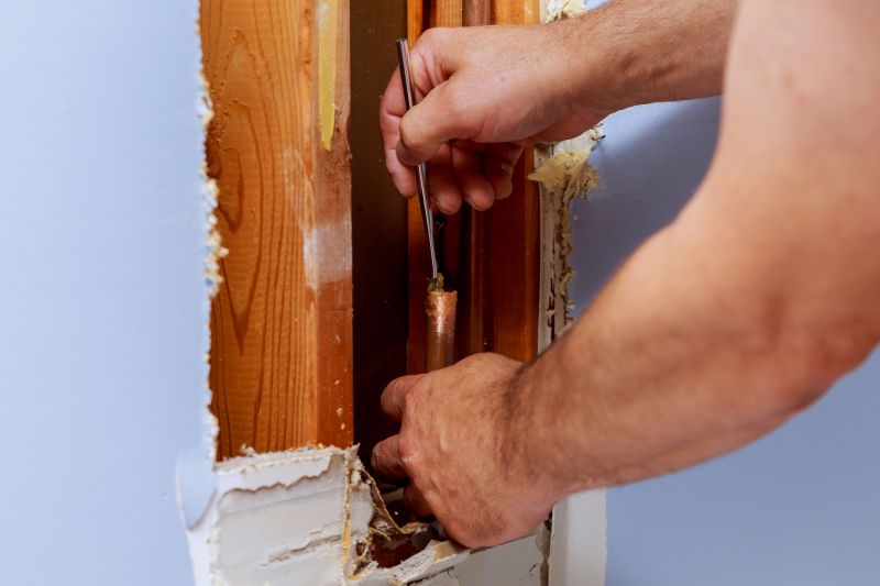 Plumber repairing a pipe